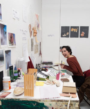 Kristina Hagman works in her studio